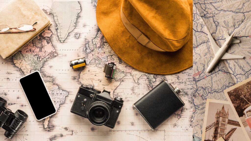 map-cap-camera-small-book-pen-exploring-costco-travel